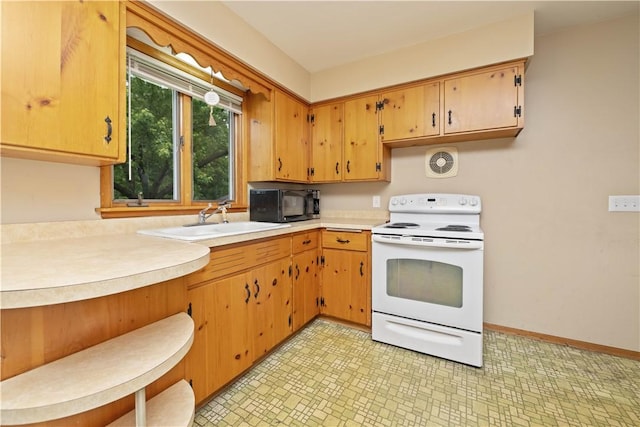 970 Elmgrove Rd, Gates, NY 14624 - kitchen with white electric stove, black microwave, light flooring, and light countertops