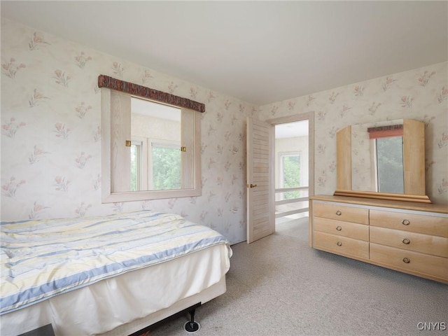 21751 Hewitt Dr, Champion, NY 13619 - bedroom featuring wallpapered walls and carpet
