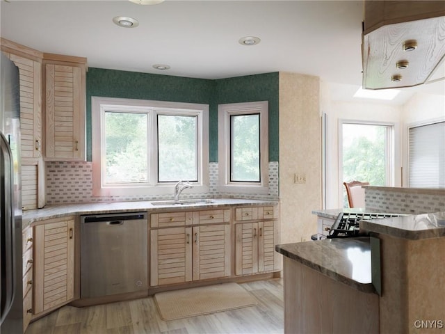 21751 Hewitt Dr, Champion, NY 13619 - kitchen with appliances with stainless steel finishes, backsplash, and light brown cabinets