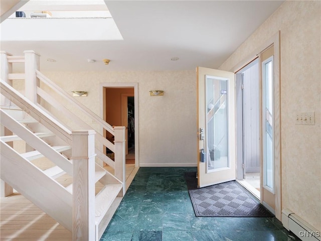 21751 Hewitt Dr, Champion, NY 13619 - entrance foyer with a baseboard radiator and stairs