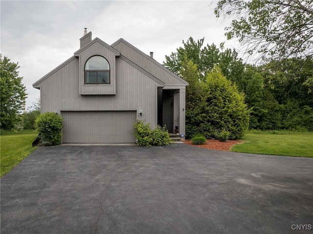 21751 Hewitt Dr, Champion, NY 13619 - view of front of property featuring a chimney and a front lawn