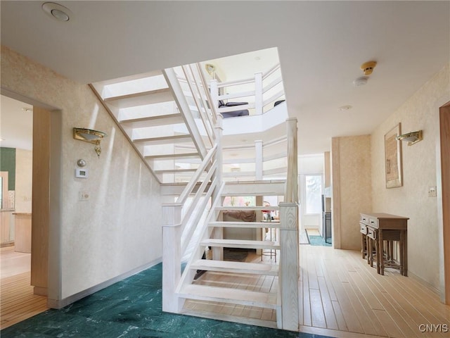 21751 Hewitt Dr, Champion, NY 13619 - stairs featuring wood finished floors