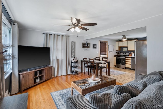 120 Gordon Rd, Clay, NY 13212 - living area featuring a ceiling fan and light wood-type flooring