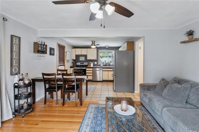 120 Gordon Rd, Clay, NY 13212 - living room with a ceiling fan and light wood-style flooring