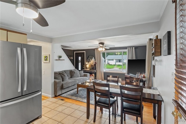 120 Gordon Rd, Clay, NY 13212 - dining area with a ceiling fan, light tile patterned flooring, and ornamental molding