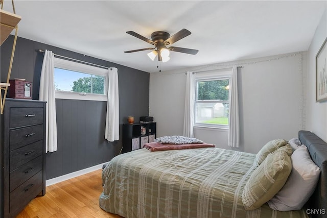 120 Gordon Rd, Clay, NY 13212 - bedroom featuring multiple windows, light wood finished floors, and a ceiling fan