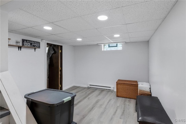 120 Gordon Rd, Clay, NY 13212 - workout area featuring a baseboard radiator, wood finished floors, recessed lighting, and a paneled ceiling