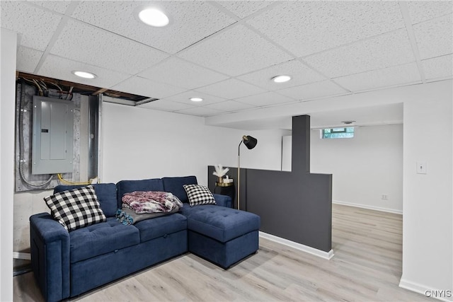 120 Gordon Rd, Clay, NY 13212 - living room featuring electric panel, wood finished floors, a drop ceiling, and recessed lighting
