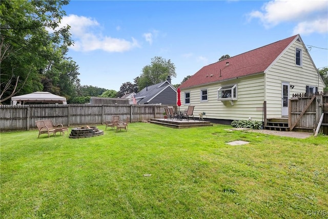 120 Gordon Rd, Clay, NY 13212 - fenced backyard featuring a fire pit and a wooden deck