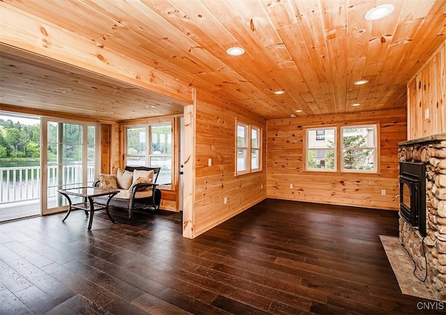 5345 Paddleford Rd, Eaton, NY 13334 - living area featuring dark wood finished floors, recessed lighting, wooden ceiling, wood walls, and plenty of natural light