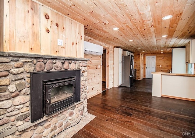 5345 Paddleford Rd, Eaton, NY 13334 - unfurnished living room featuring a wall mounted AC, dark wood-style flooring, recessed lighting, wood ceiling, and a fireplace