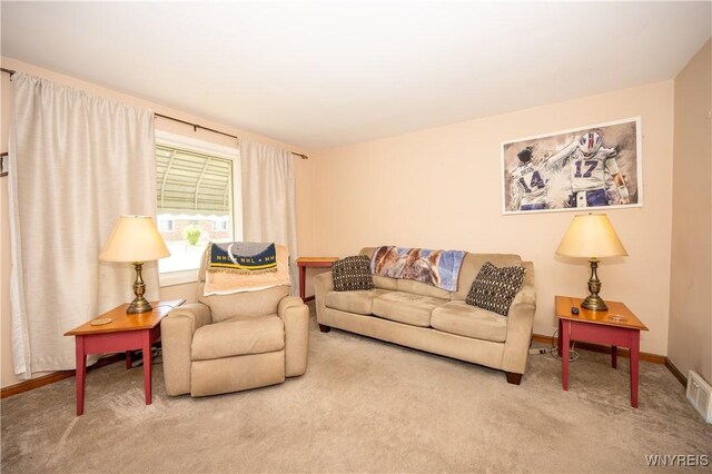 241 Shanley St, Cheektowaga, NY 14206 - carpeted living area featuring baseboards