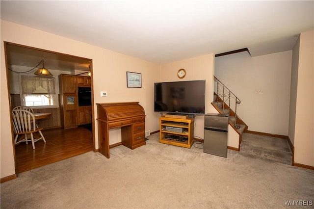 241 Shanley St, Cheektowaga, NY 14206 - carpeted living area with stairway and baseboards