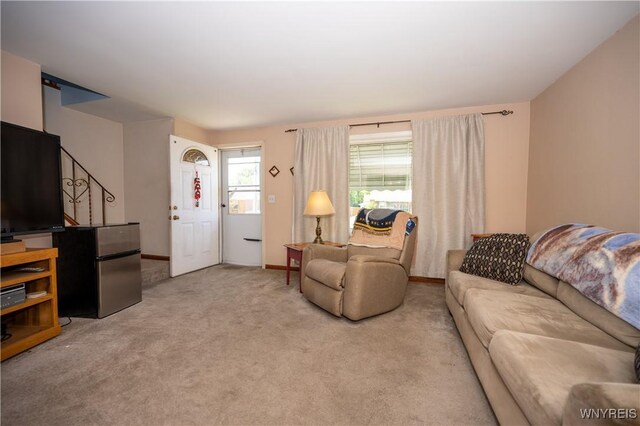 241 Shanley St, Cheektowaga, NY 14206 - living room featuring light colored carpet and stairway