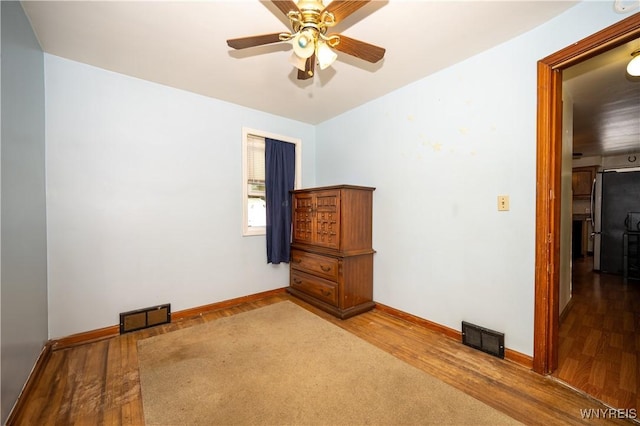 241 Shanley St, Cheektowaga, NY 14206 - unfurnished room featuring wood finished floors and a ceiling fan