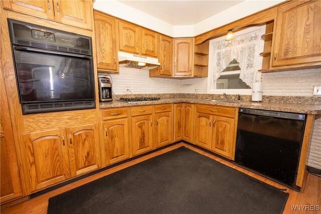 241 Shanley St, Cheektowaga, NY 14206 - kitchen featuring black appliances, under cabinet range hood, open shelves, and tasteful backsplash