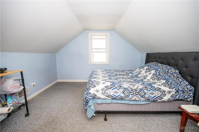 241 Shanley St, Cheektowaga, NY 14206 - carpeted bedroom featuring vaulted ceiling and baseboards