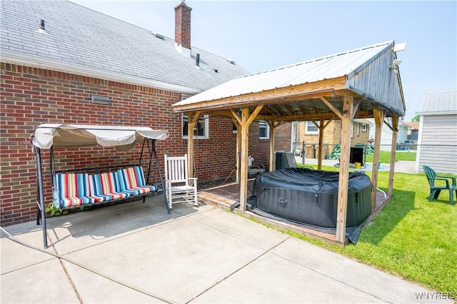 241 Shanley St, Cheektowaga, NY 14206 - view of patio / terrace with a hot tub and a gazebo