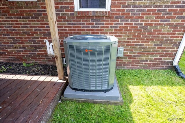 241 Shanley St, Cheektowaga, NY 14206 - exterior view of a central air condition unit and brick siding
