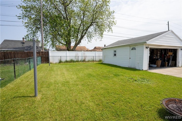 241 Shanley St, Cheektowaga, NY 14206 - fenced backyard with a garage and an outbuilding