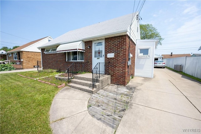 241 Shanley St, Cheektowaga, NY 14206 - view of front of house with brick siding and driveway