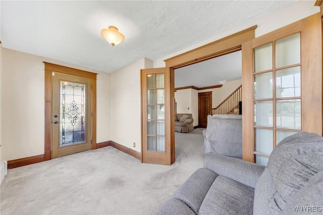 749 Colvin Blvd, Tonawanda-Town, NY 14217 - carpeted foyer featuring baseboards and stairs