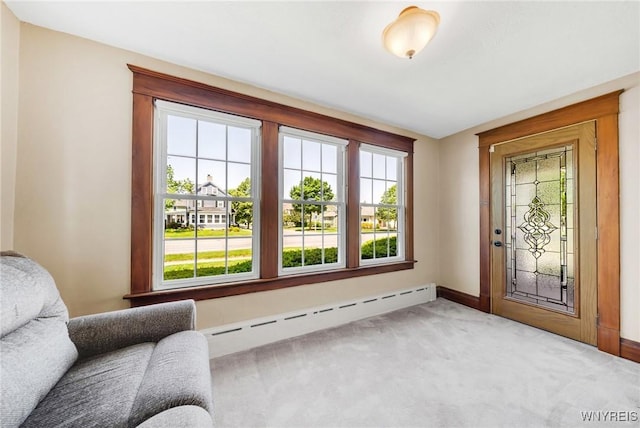 749 Colvin Blvd, Tonawanda-Town, NY 14217 - entryway with baseboard heating, plenty of natural light, and light carpet