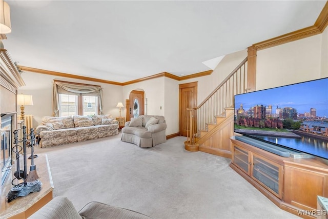 749 Colvin Blvd, Tonawanda-Town, NY 14217 - living area with arched walkways, carpet, stairway, crown molding, and a glass covered fireplace