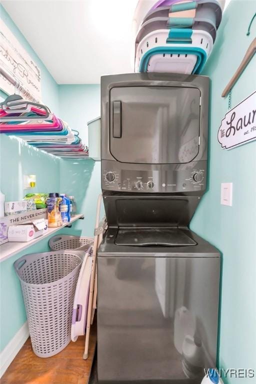 749 Colvin Blvd, Tonawanda-Town, NY 14217 - laundry room with stacked washer / drying machine and wood finished floors