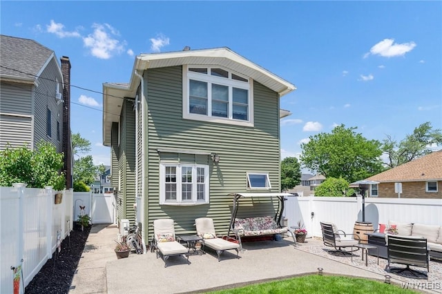 749 Colvin Blvd, Tonawanda-Town, NY 14217 - rear view of property featuring outdoor lounge area, a patio, and a fenced backyard