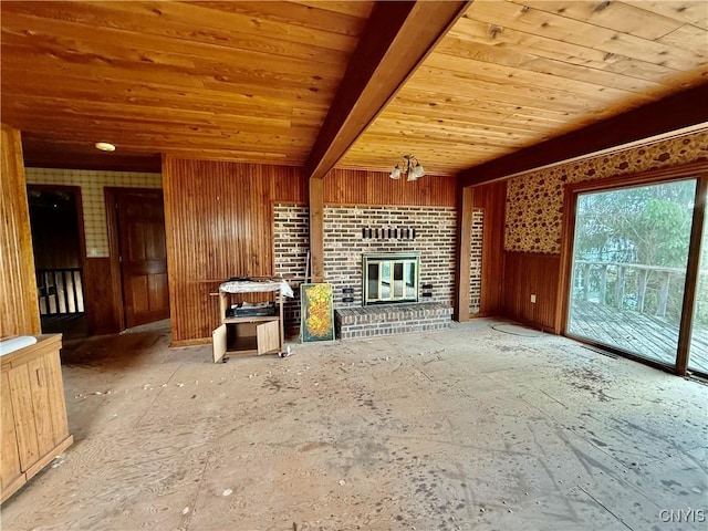 2600 Abend Pt, Marcellus, NY 13110 - unfurnished living room featuring wooden ceiling and a brick fireplace