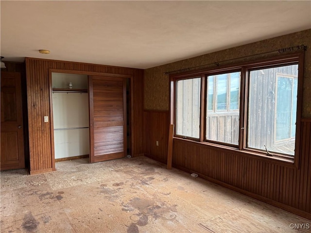 2600 Abend Pt, Marcellus, NY 13110 - unfurnished room featuring wooden walls and a smoke detector