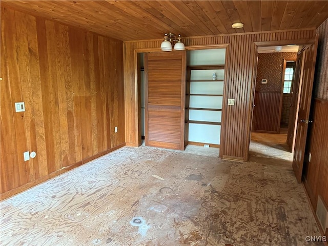 2600 Abend Pt, Marcellus, NY 13110 - spare room featuring wood walls and wooden ceiling