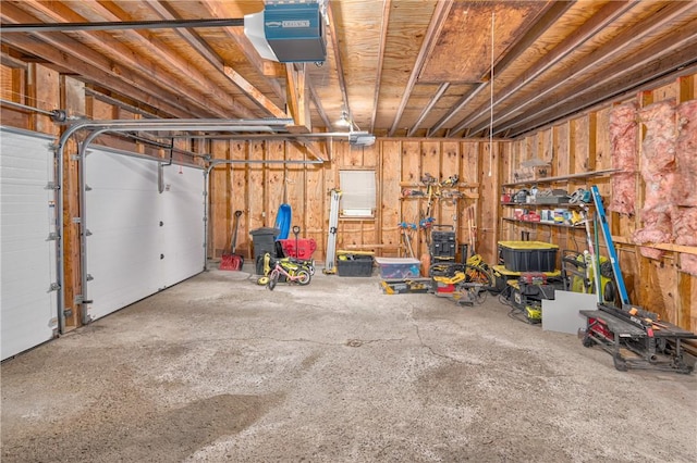 22 Bugbee Rd, Oneonta-City, NY 13820 - garage featuring a garage door opener