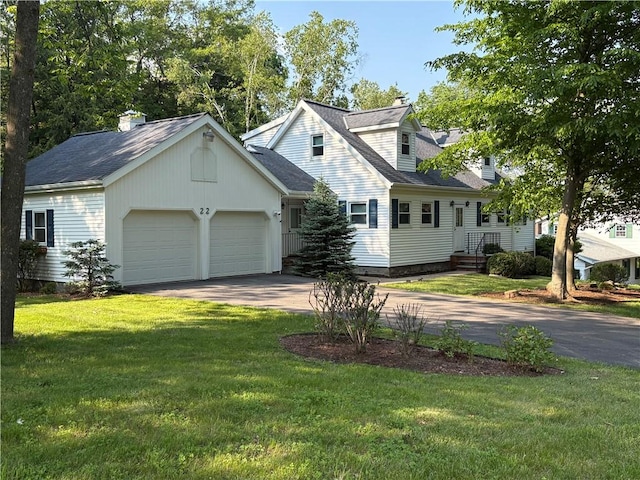 22 Bugbee Rd, Oneonta-City, NY 13820 - cape cod home featuring a garage, driveway, a front lawn, and a shingled roof