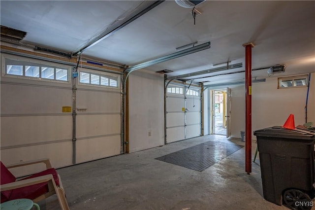 142 S Shore Rd, Webb, NY 13420 - garage featuring a garage door opener