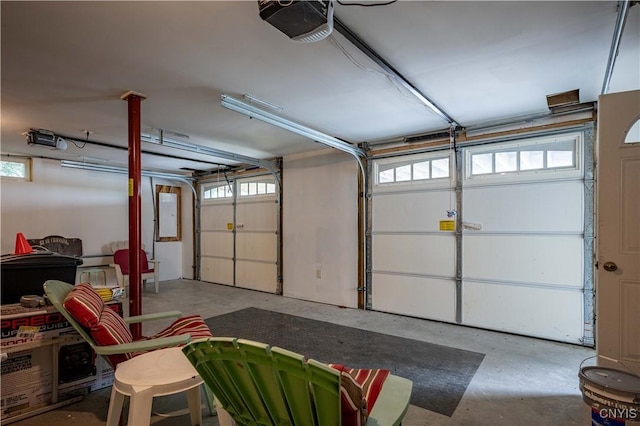 142 S Shore Rd, Webb, NY 13420 - garage featuring a garage door opener