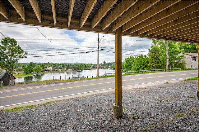 142 S Shore Rd, Webb, NY 13420 - view of patio / terrace with a water view