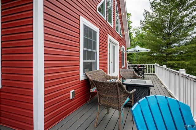 142 S Shore Rd, Webb, NY 13420 - wooden deck featuring outdoor dining area