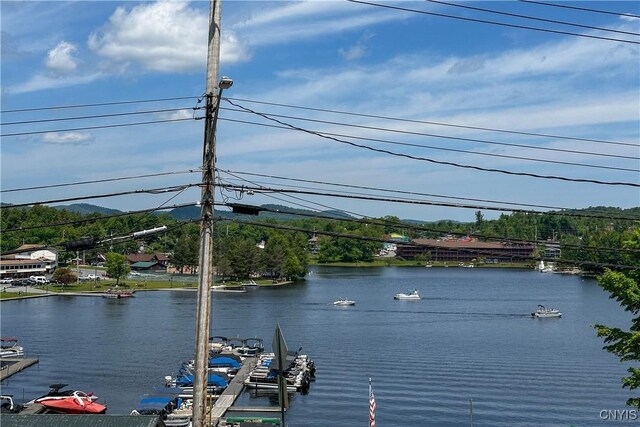 142 S Shore Rd, Webb, NY 13420 - water view with a mountain backdrop