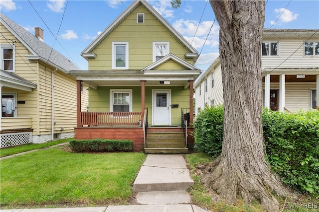 1221 Haeberle Ave, Niagara Falls, NY 14301 - view of front of home with covered porch and a front lawn