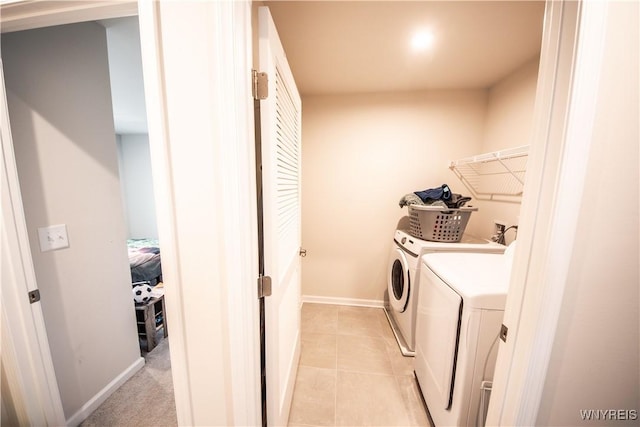 510 Limestone Ct, Grand Island, NY 14072 - washroom featuring separate washer and dryer and light tile patterned floors