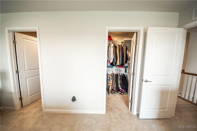 510 Limestone Ct, Grand Island, NY 14072 - unfurnished bedroom with light carpet, a walk in closet, and a closet