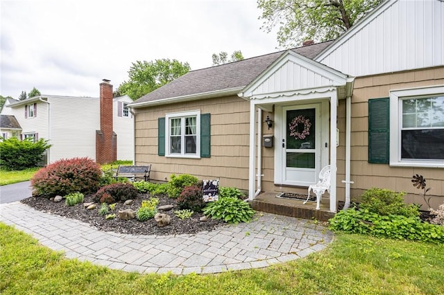 309 Brandon Rd, Irondequoit, NY 14622 - view of front of property with board and batten siding and roof with shingles