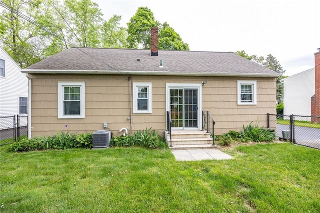 309 Brandon Rd, Irondequoit, NY 14622 - back of property featuring a chimney, entry steps, and roof with shingles