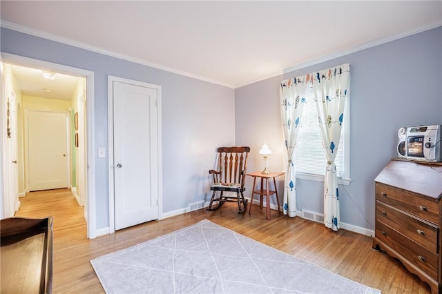 309 Brandon Rd, Irondequoit, NY 14622 - living area with light wood-style flooring and ornamental molding