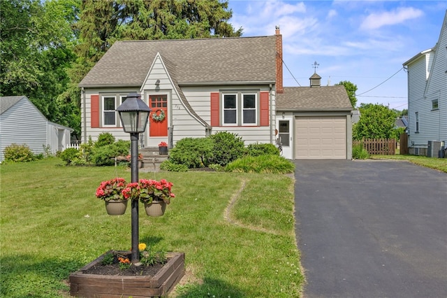 316 Walzer Rd, Irondequoit, NY 14622 - view of front facade with a chimney, asphalt driveway, roof with shingles, and an attached garage