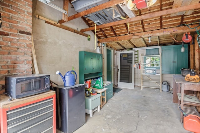 316 Walzer Rd, Irondequoit, NY 14622 - garage featuring fridge