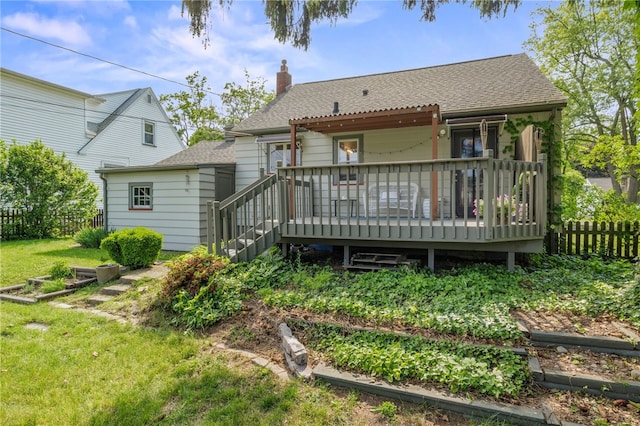 316 Walzer Rd, Irondequoit, NY 14622 - rear view of house featuring a chimney, a deck, and roof with shingles