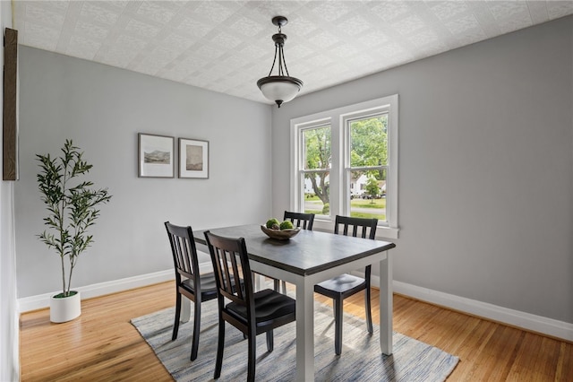 316 Walzer Rd, Irondequoit, NY 14622 - dining area featuring wood finished floors and an ornate ceiling